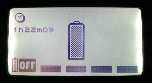 Compex Muscle Stimulator backlit display showing battery is fully charged