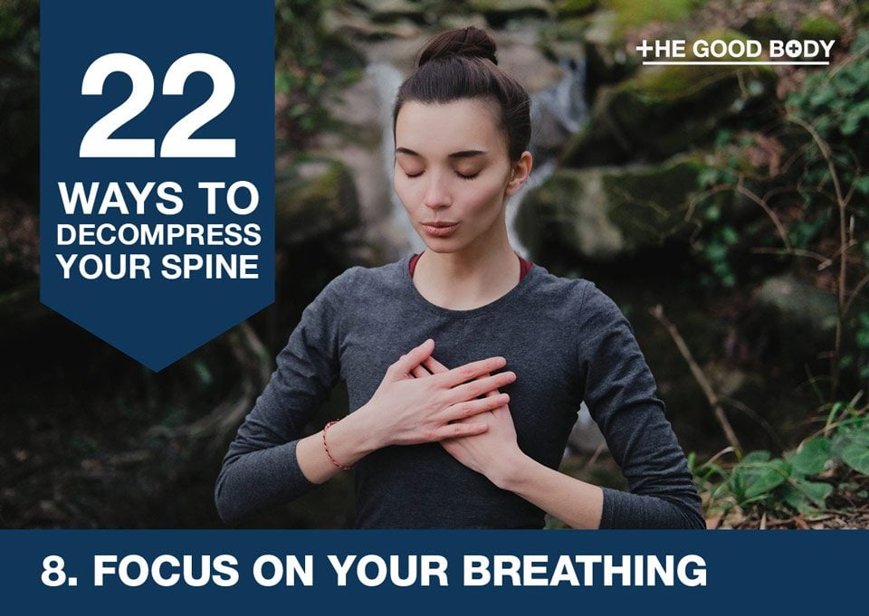 Focus on your breathing to decompress your spine