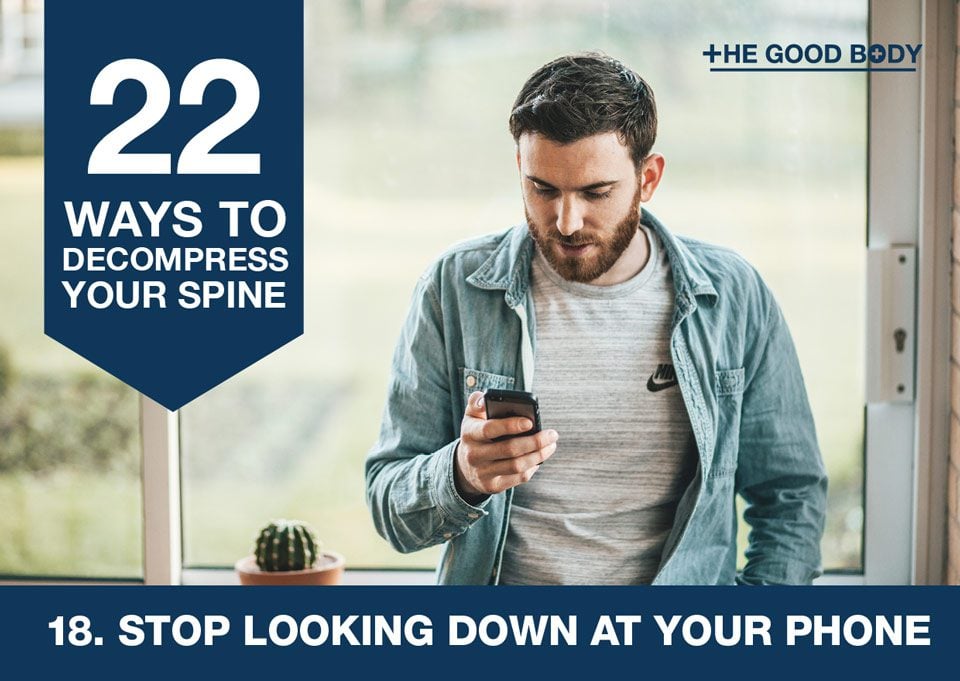 Stop looking down at your phone to decompress your spine