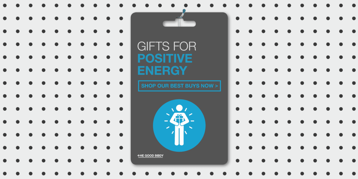 Gift card on a pegboard, with illustration of person radiating positivity holding present, titled 'Gifts for Positive Energy'.